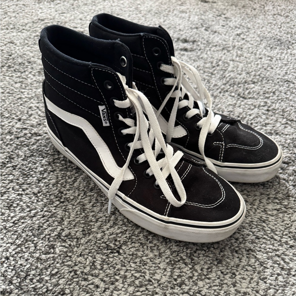 Vans Woman’s Black and White High-Top Sneakers